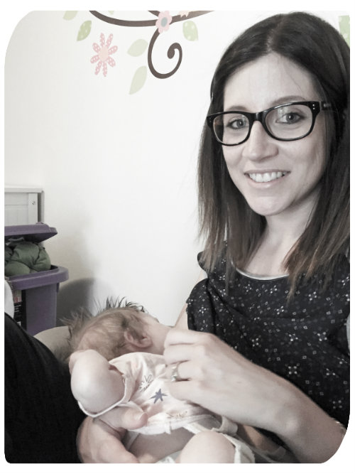 Jessica breastfeeding Mackenzie in a pavlik harness